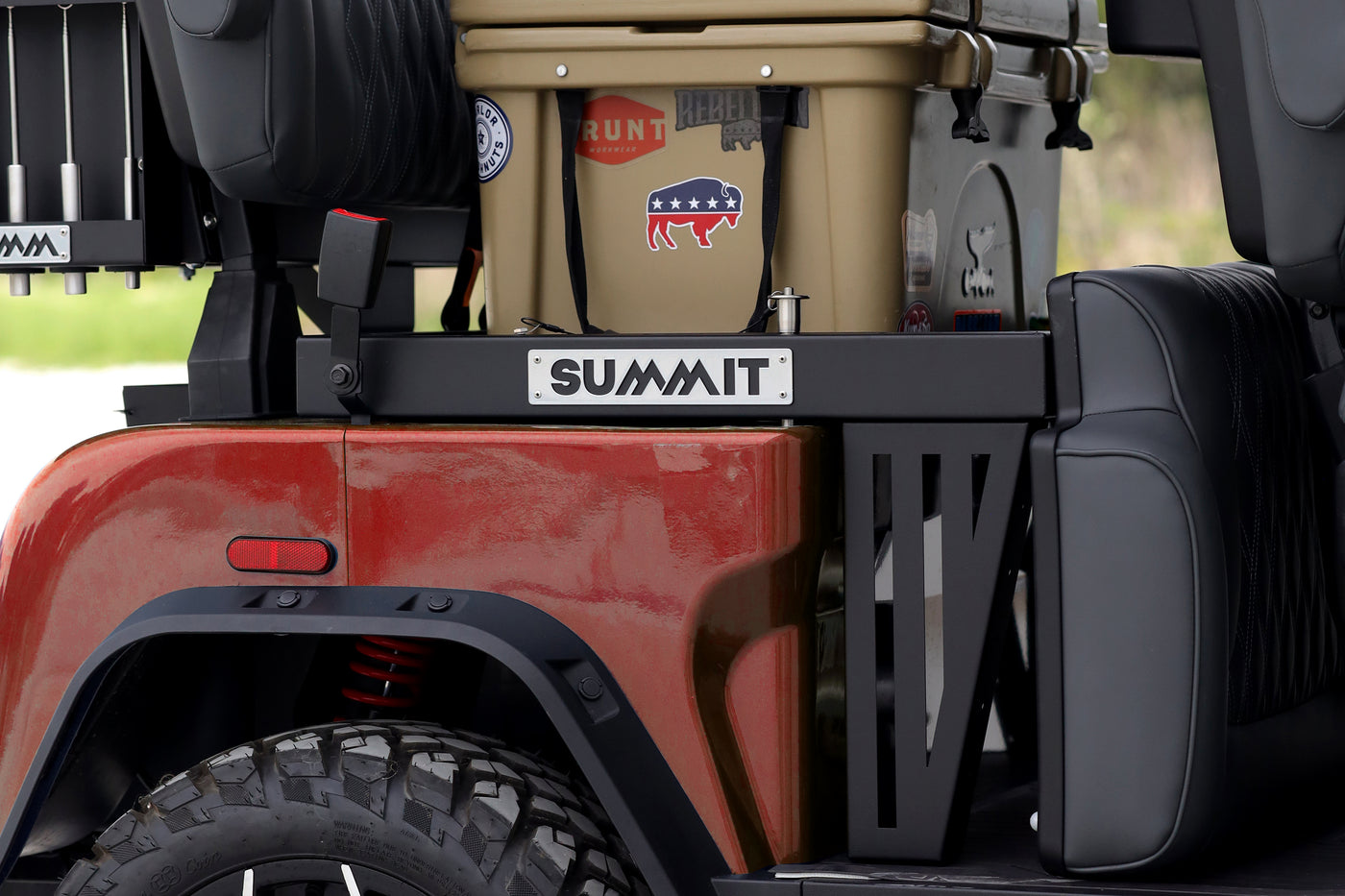 StowPro heavy-duty cargo deck installed on a Denago Rover golf cart, loaded with a large cooler